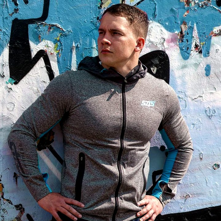 Full-zip front with zipped pockets and blue side panels